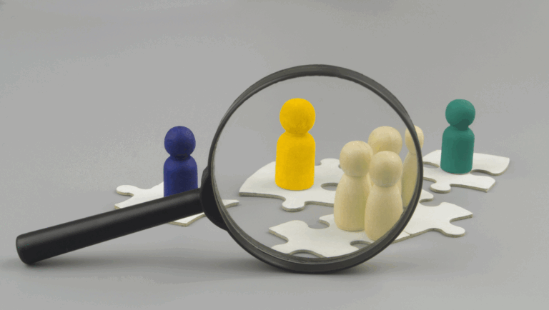 Jigsaw figures magnifying glass